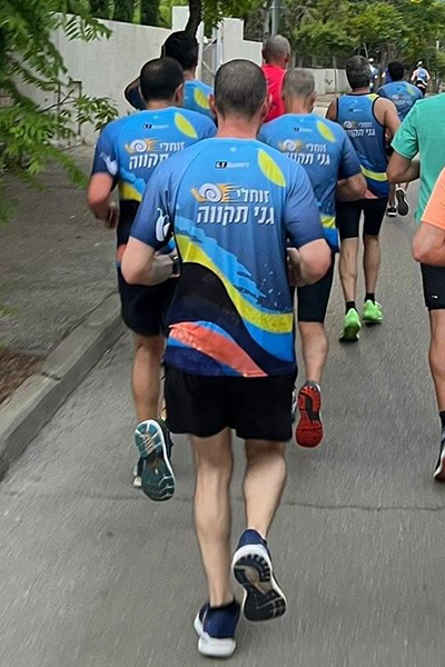 ביגוד קבוצת הריצה זוחלי גני תקווה