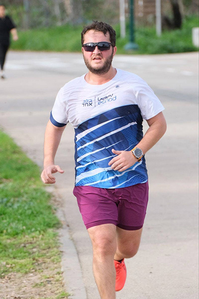 ביגוד לנבחרות הריצה והטריאתלון של עמותת בלב אחד